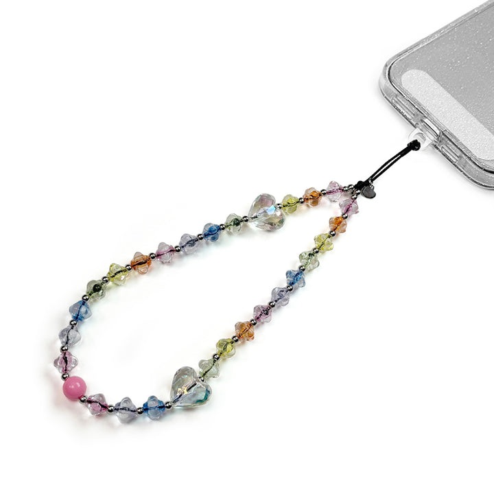 Dream Hatossa Phone charm attached to a phone with a universal lanyard holder. 
