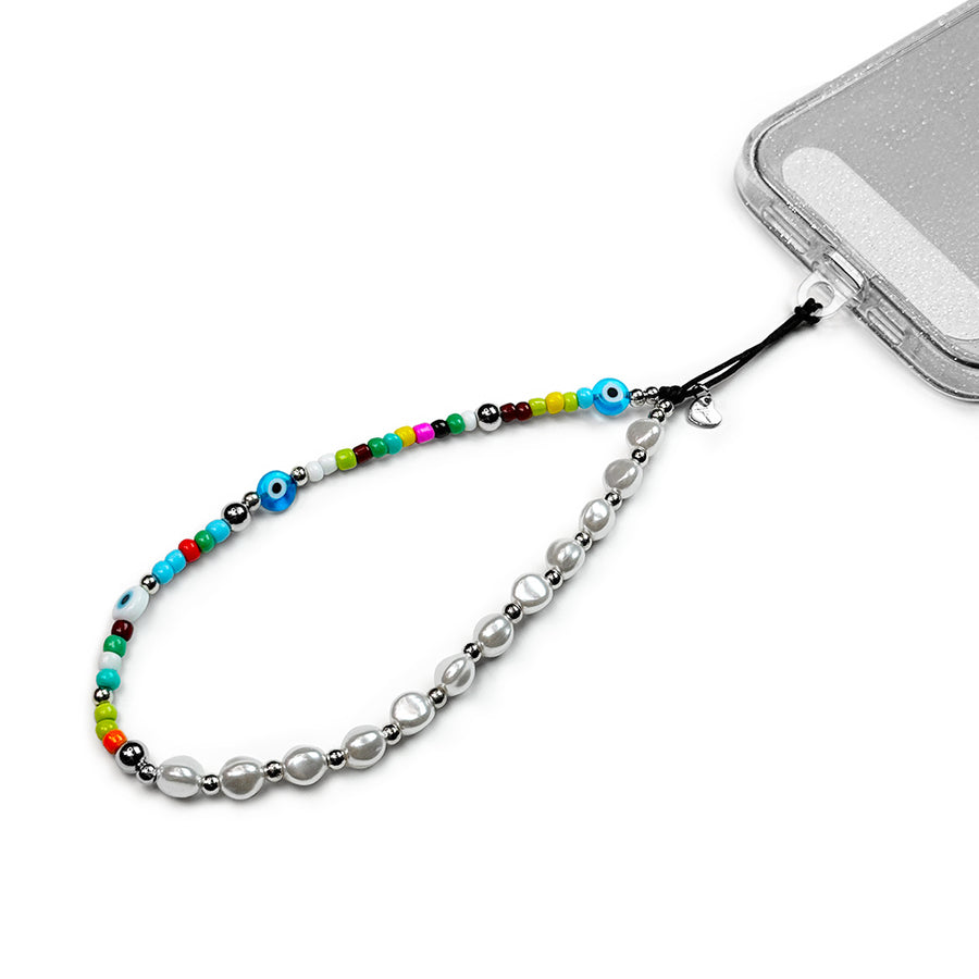 Gemini Hatossa Phone charm attached to a phone with a universal lanyard holder. 
