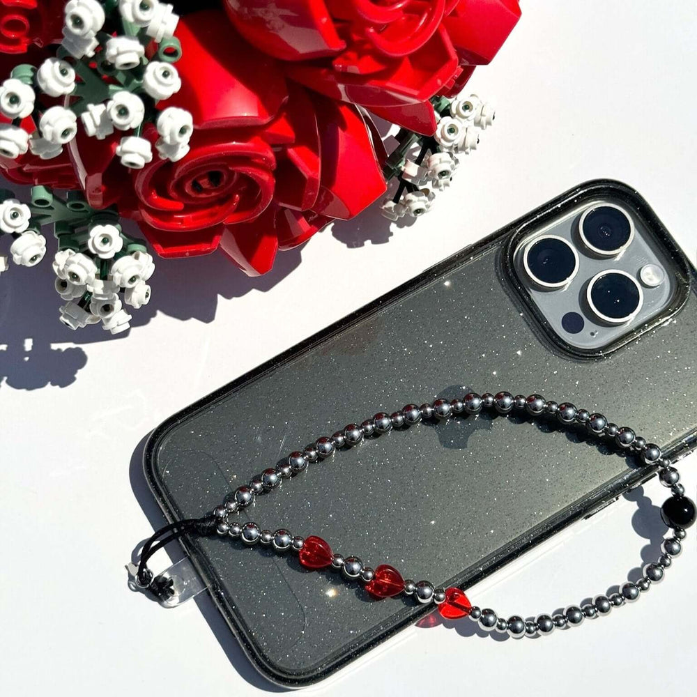 Image shows the Hatossa NOVA phone strap, phone charm, with the universal lanyard holder that can be used with any device, ebook, airpods