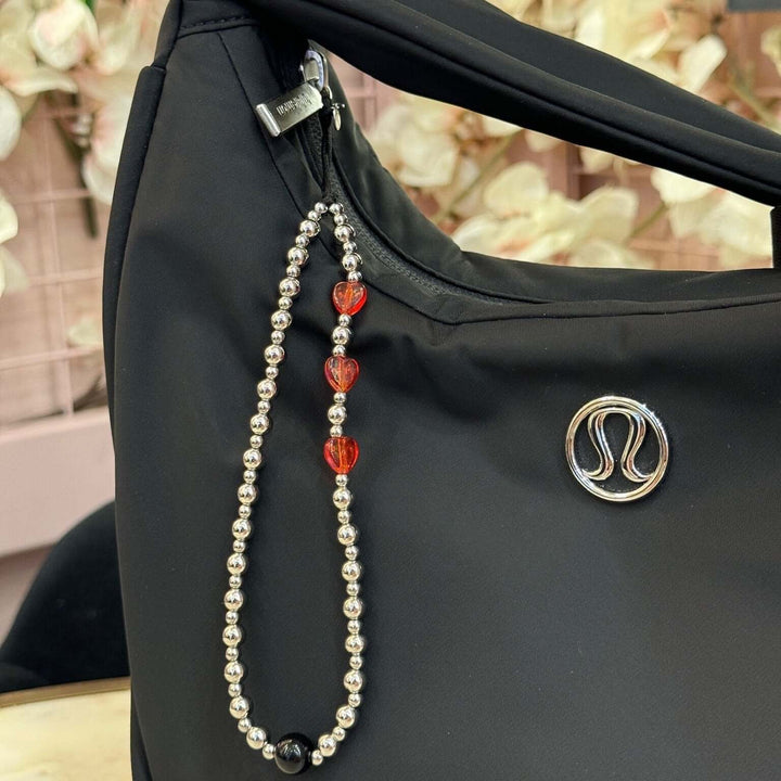 Nova Hatossa phone strap, phone charm, charm used on a bag as an accessory.