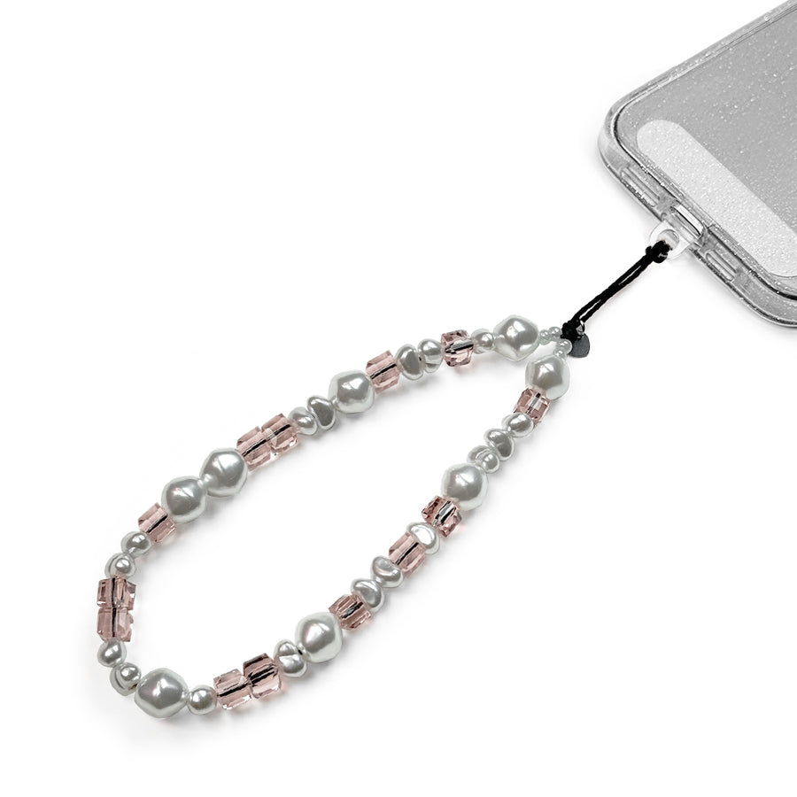Rose Hatossa Phone charm attached to a phone with a universal lanyard holder. 