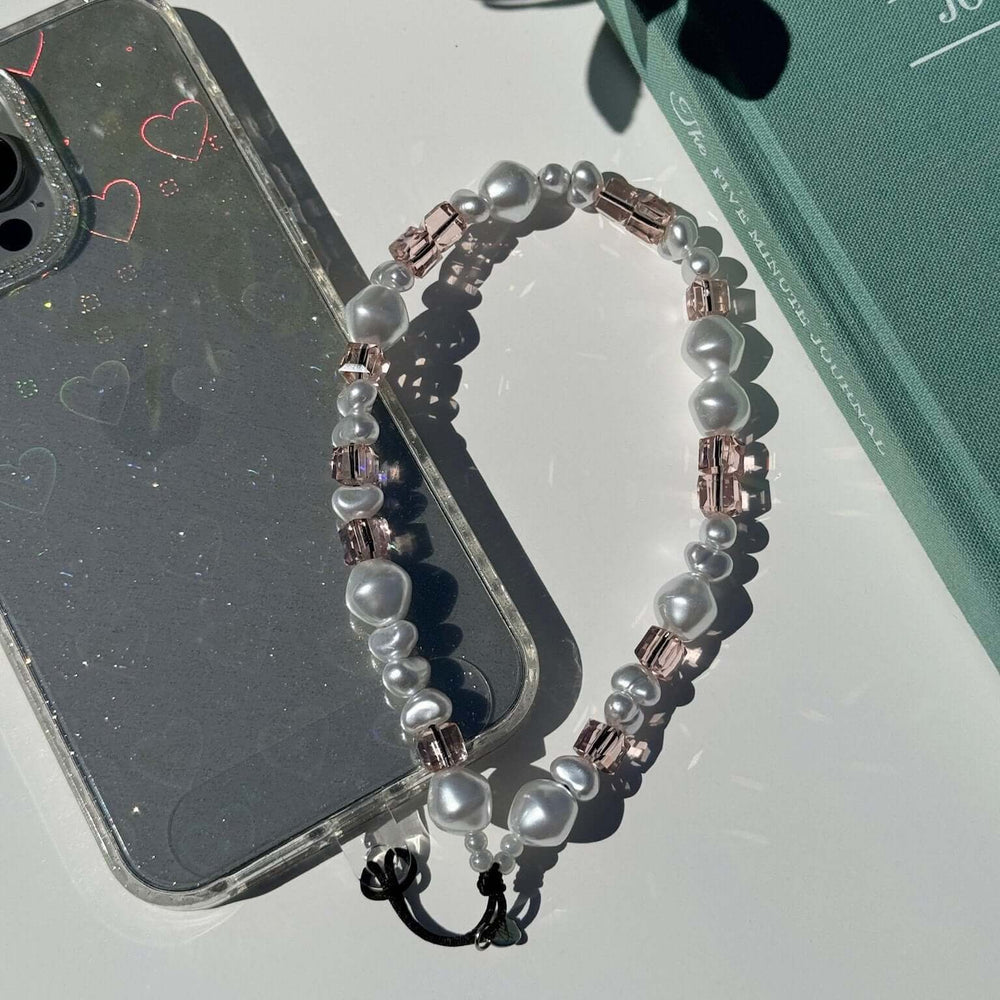 Image shows the Hatossa Rose phone strap, phone charm, with the universal lanyard holder that can be used with any device, ebook, airpods