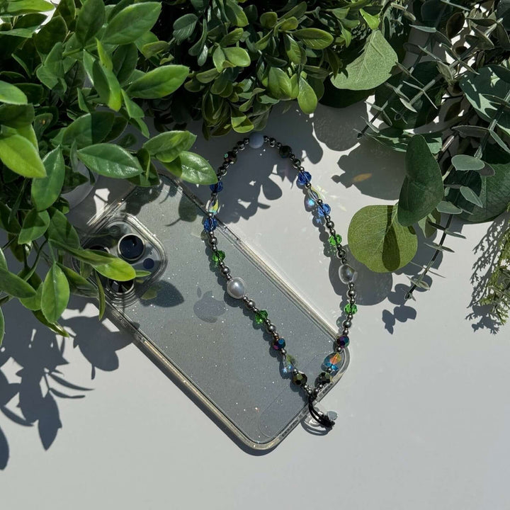 Image shows the Hatossa Royalty phone strap, phone charm, with the universal lanyard holder that can be used with any device, ebook, airpods