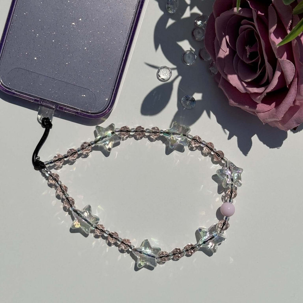 Image shows the Hatossa STARLIGHT phone strap, phone charm, with the universal lanyard holder that can be used with any device, ebook, airpods