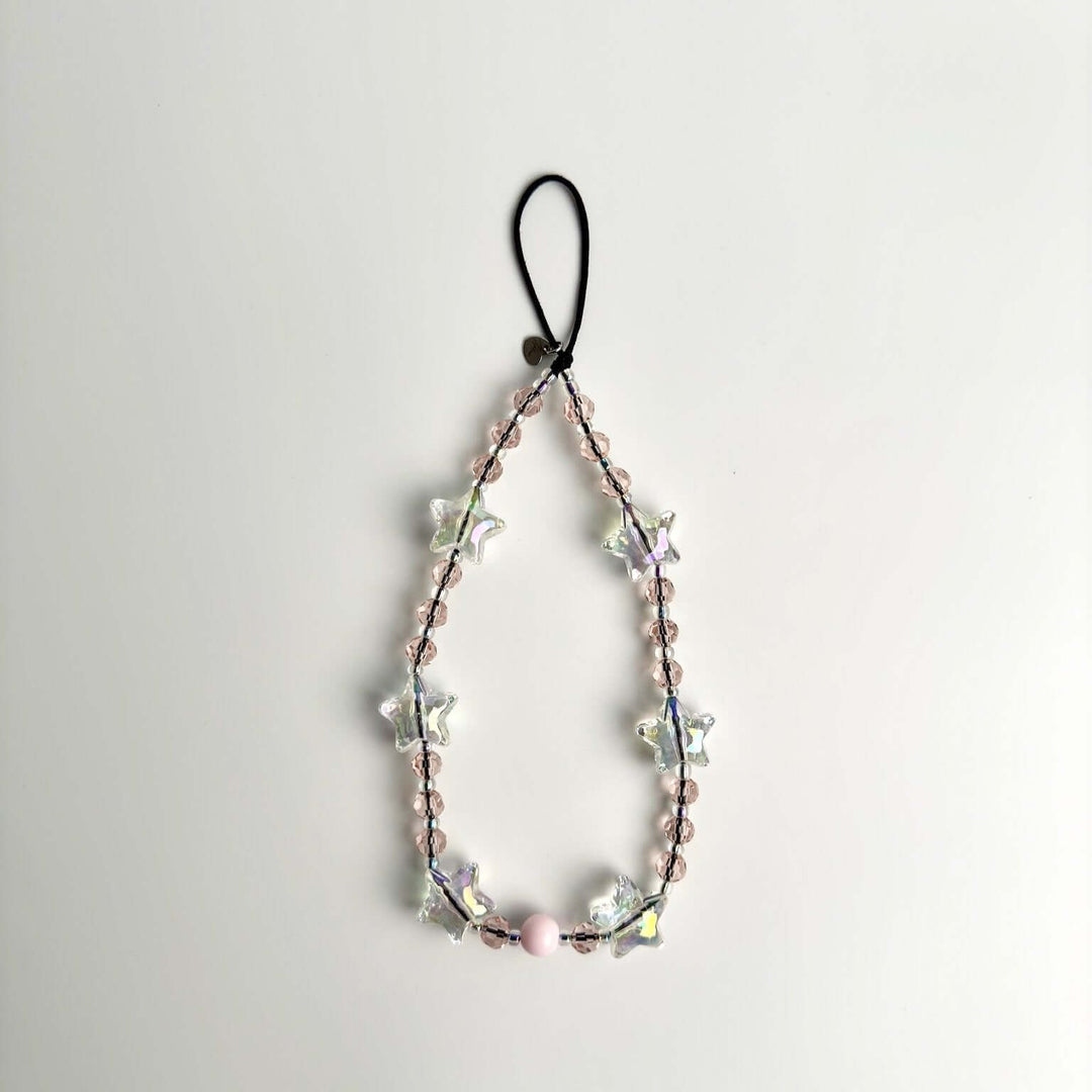 Image shows the Hatossa STARLIGHT phone strap, phone charm, with the universal lanyard holder that can be used with any device, ebook, airpods
