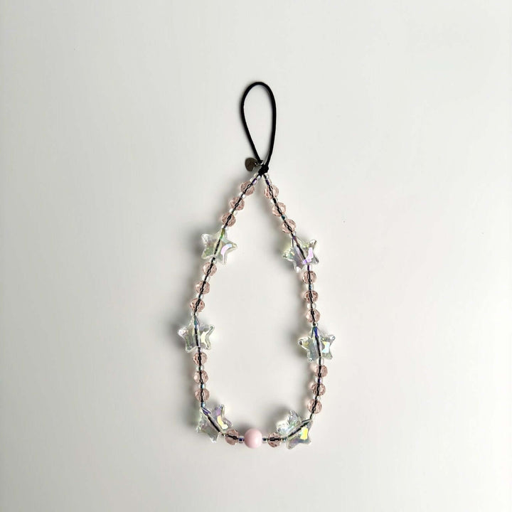 Image shows the Hatossa STARLIGHT phone strap, phone charm, with the universal lanyard holder that can be used with any device, ebook, airpods