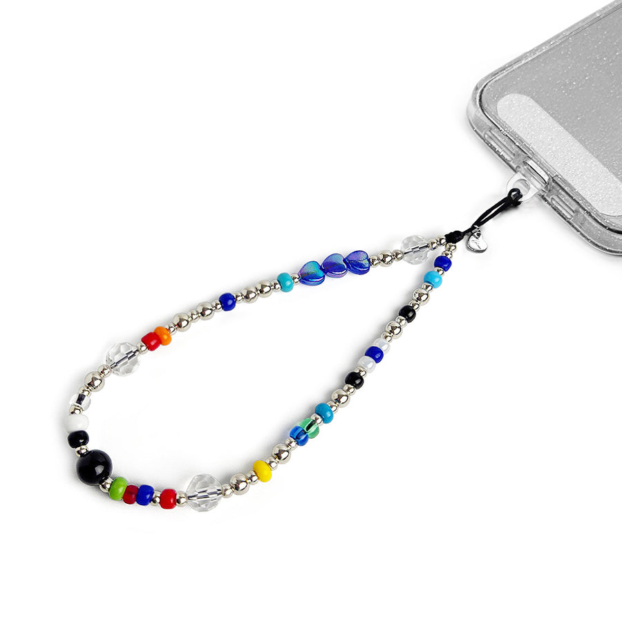 Stella Hatossa Phone charm attached to a phone with a universal lanyard holder. 