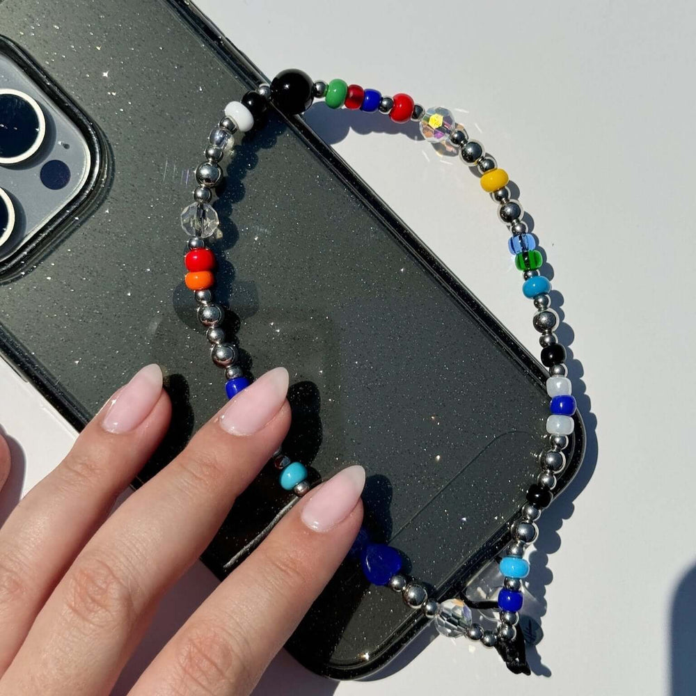 Image shows the Hatossa STELLA phone strap, phone charm, with the universal lanyard holder that can be used with any device, ebook, airpods