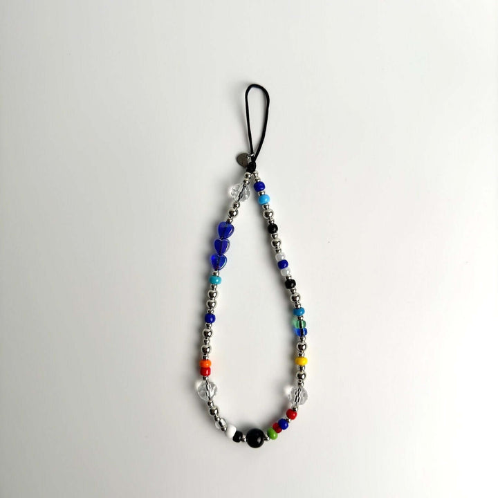 Image shows the Hatossa STELLA phone strap, phone charm, with the universal lanyard holder that can be used with any device, ebook, airpods