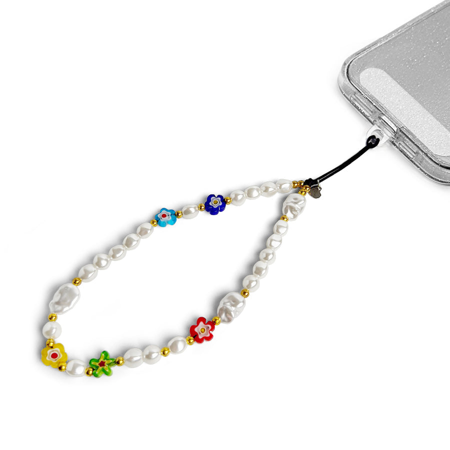Summer Hatossa Phone charm attached to a phone with a universal lanyard holder. 