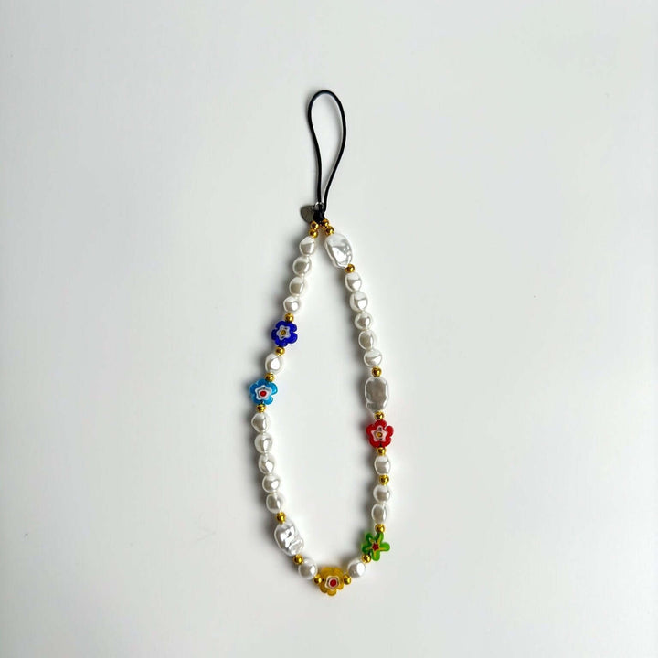 Image shows the Hatossa Summer phone strap, phone charm, with the universal lanyard holder that can be used with any device, ebook, airpods