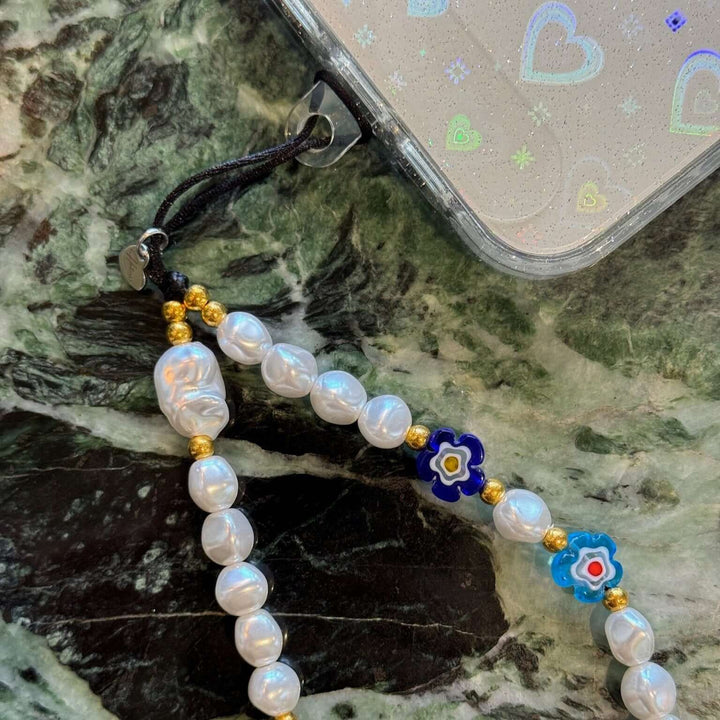 Image shows the Hatossa Summer phone strap, phone charm, with the universal lanyard holder that can be used with any device, ebook, airpods
